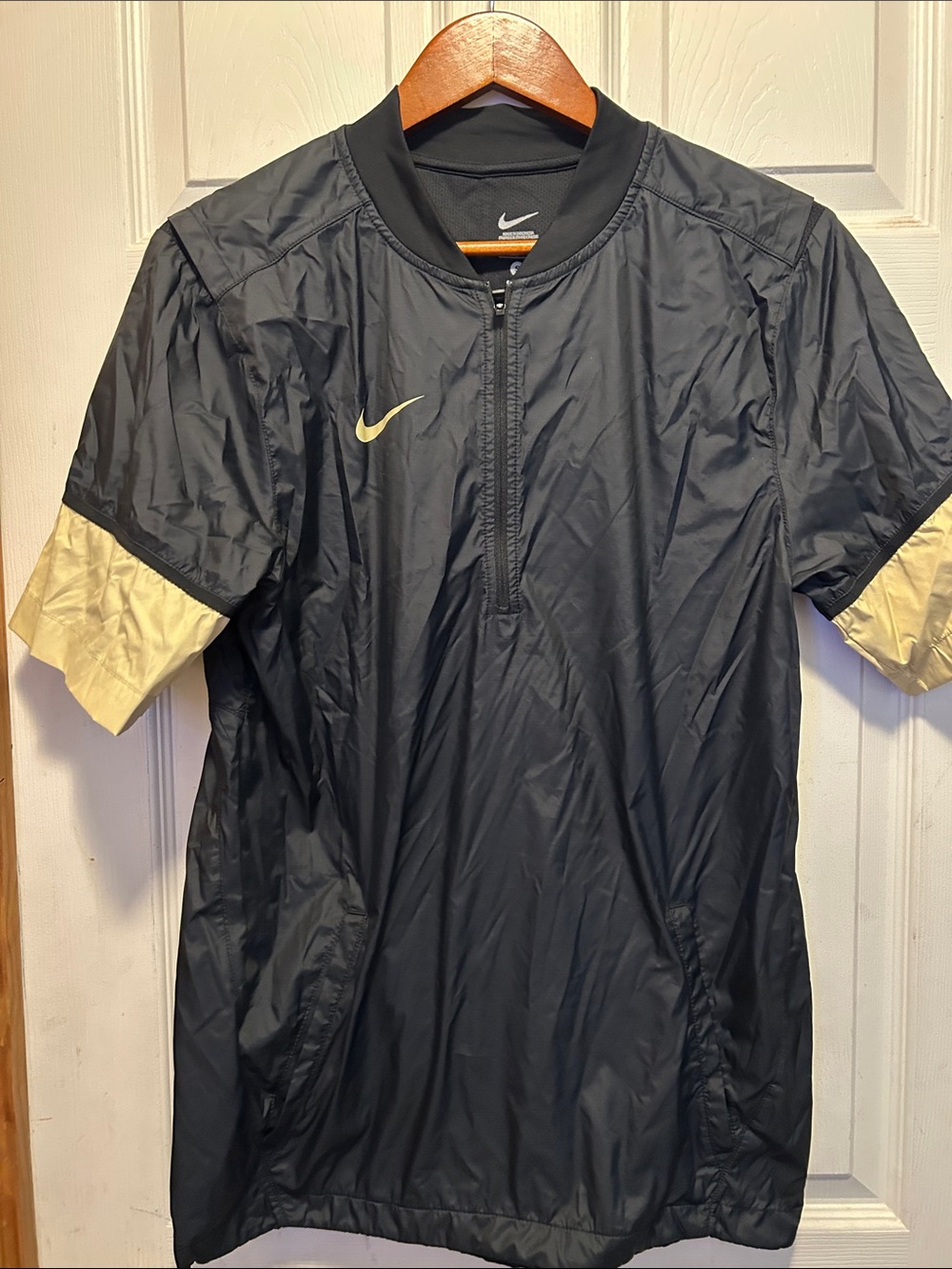 Nike Men’s Black Short-Sleeve Pullover Jacket with Gold Accents